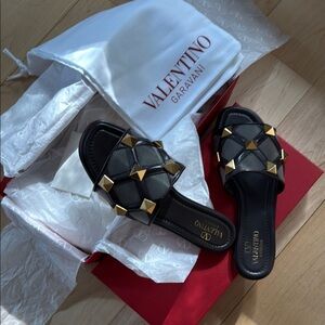 Valentino Garavani Black and Gold Gladiator Sandals